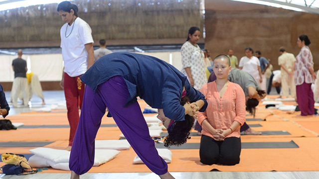 Our teacher Marina in blue and purple during her classical Hatha yoga training in India